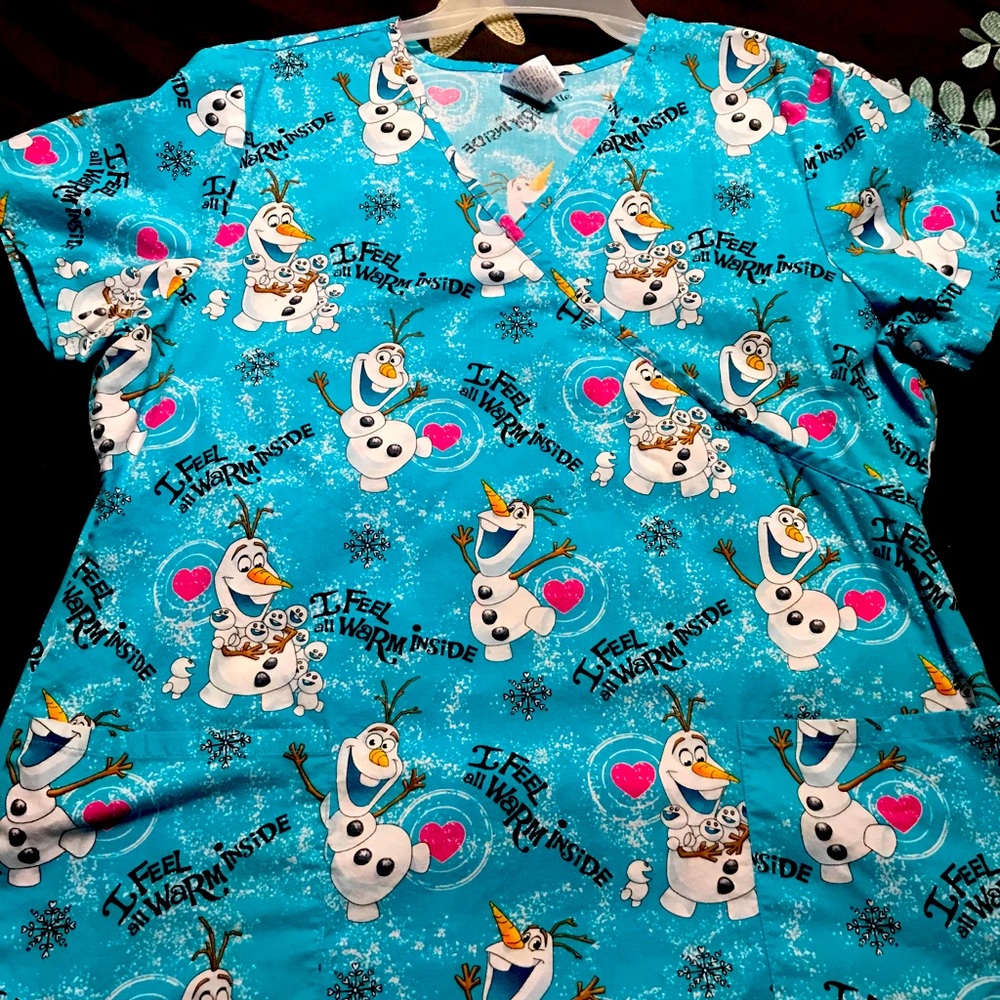 Olof scrub top.   No stains. (No longer at elem)
